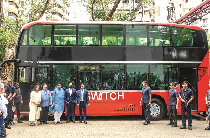 Nitin Gadkari and other dignitaries at the inauguration of the new electric AC double decker bus