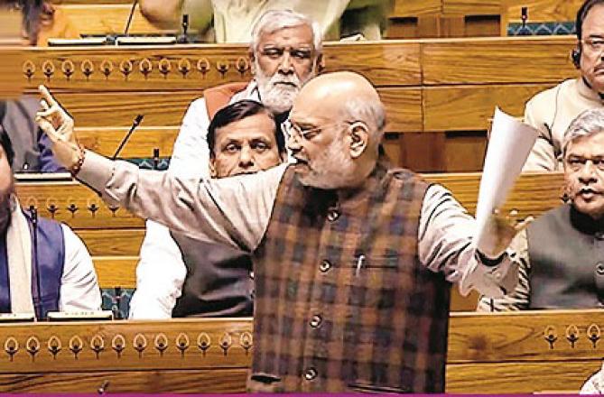 Home Minister Amit Shah in the Lok Sabha. Photo: INN