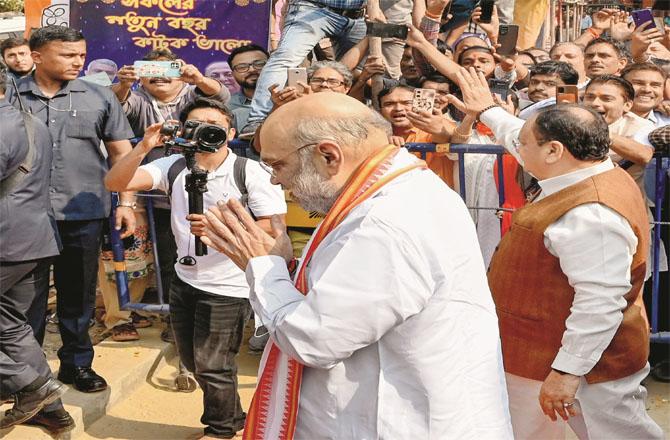 Amit Shah and JP Nadda among the public in Kolkata. (PTI)