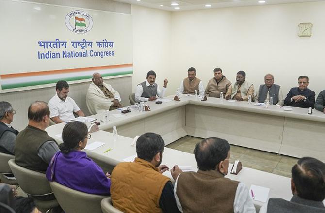 Mallikarjun Kharge and Rahul Gandhi with other leaders during the meeting. Photo: PTI