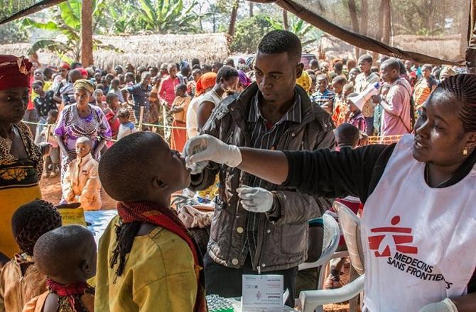 A child in Africa is being given anti-cholera medicine. Photo: INN.