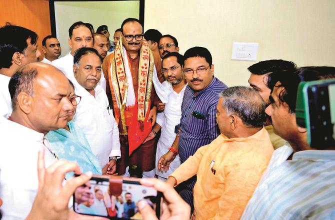 Brajesh Pathak with BJP workers at Circuit House in Mainpuri. Photo: INN