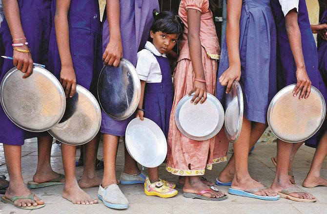 India is the second largest food producing country in the world, yet children suffer from malnutrition in large numbers. Photo: INN