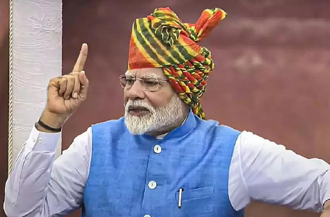 Prime Minister Modi addressing the Red Fort. Photo: PTI.