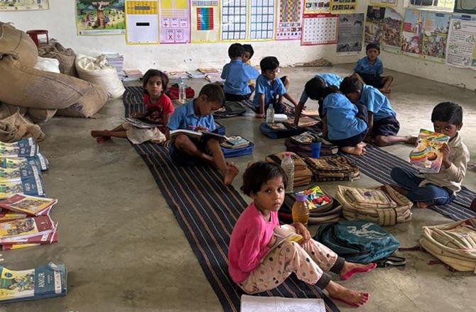 Students can be seen sitting on the floor at a school in Madhya Pradesh. Photo: X