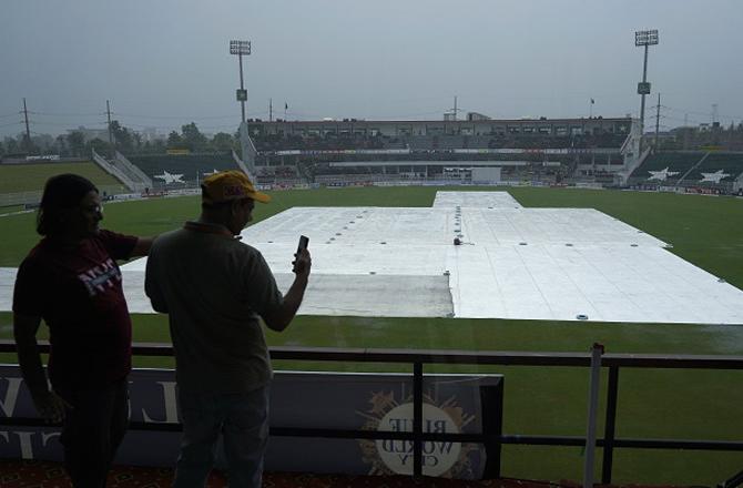 A stadium in Rawalpindi has been covered with a sheet due to rain. Photo: PTI