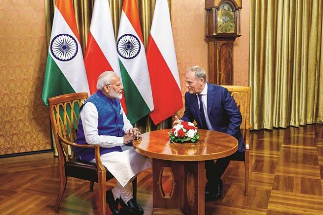 Prime Minister Modi interacting with the Prime Minister of Poland. Photo: INN