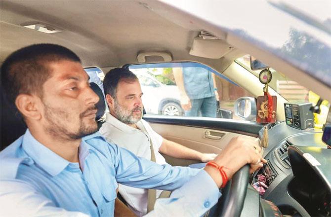 Congress leader Rahul Gandhi is seen traveling in a cab in a video posted on X on Monday. Photo: INN