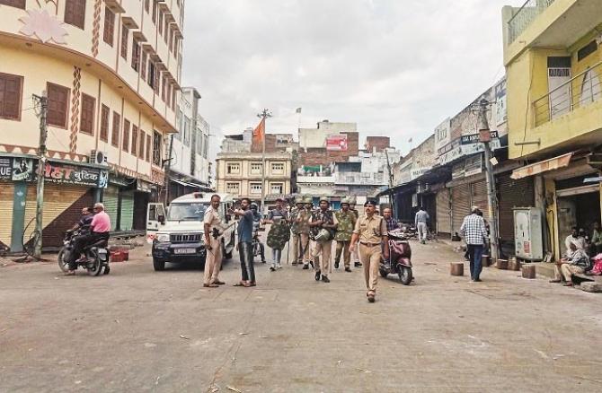 Police personnel patrolling in Udaipur city. Photo: PTI