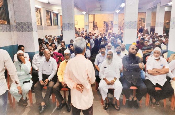 People participating in the meeting held at Anjuman Khairul Islam School and discussing about Kharoli Cemetery. Photo: Inquilab