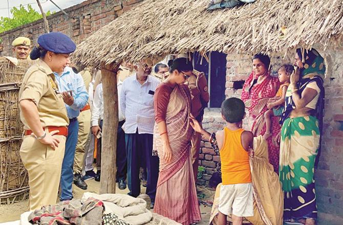 Bahraich DM Monika visits a family in a wolf-infested village. Photo: INN.