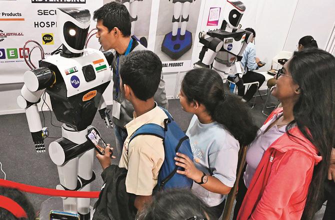 Students watching the robot exhibition. Photo: Inquilab, Syed Sameer Abdi