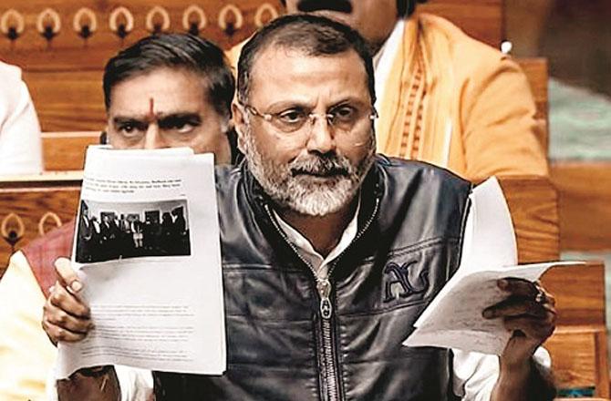 Nishinkanth Dubey showing papers against Rahul. Photo: INN