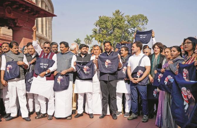 Congress MPs on Tuesday also protested inside and outside the House over the Adani-Modi relationship. Image: INN