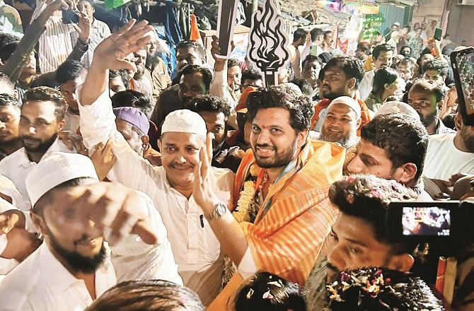 Varun Sardesai among his supporters after winning the election. Photo: INN