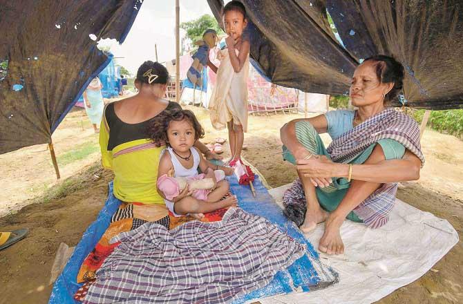 A view of a camp in Assam`s flood-hit Nagaon district. Photo: PTI