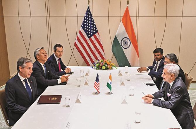 S JaiShankar and Antony Blanken in discussion in Tokyo. Photo: PTI.