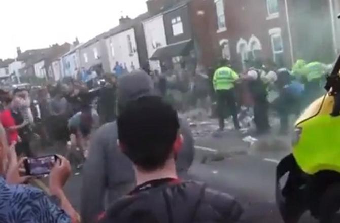 A crowd can be seen outside the mosque. Photo: X