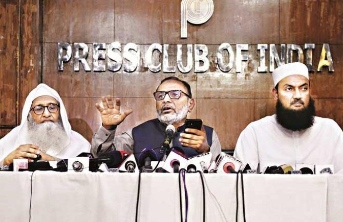 Maulana Faisal Rahmani, Dr. Qasim Rasool Ilyas and Maulana Fazl-ur-Rahim Mujadadi giving a press conference after the board meeting. Photo: INN