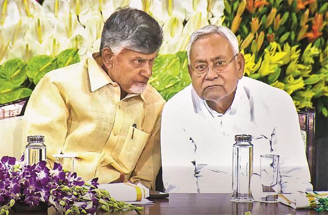 Nitish and Chandrababu in the meeting of newly elected NDA MPs on Friday. Left: Chandrababu`s son Naralokesh