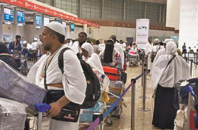 Pilgrims departing on Sunday night can be seen inside Suhar International Airport. Photo: INN