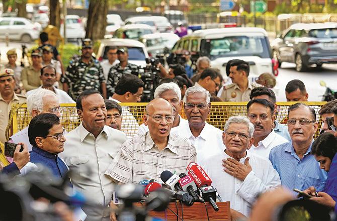 The delegation of India Alliance talking to the media after meeting with the Election Commission. Photo: PTI