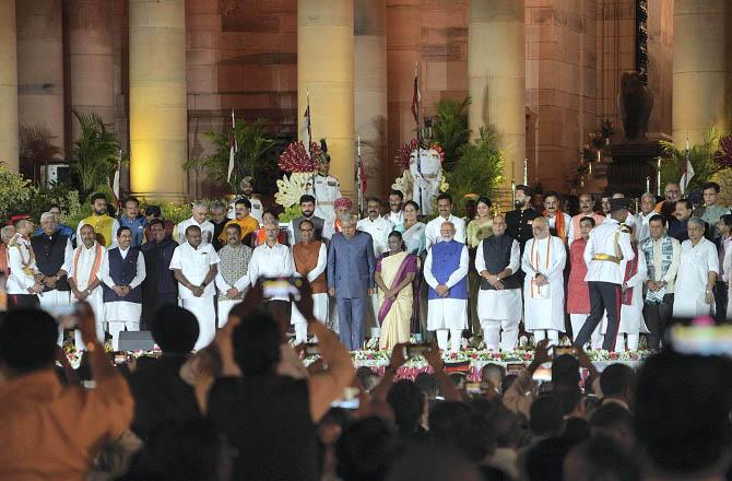 Prime Minister Narendra Modi and other ministers at the swearing-in ceremony of new Union government, at Rashtrapati Bhavan. Photo: Agency