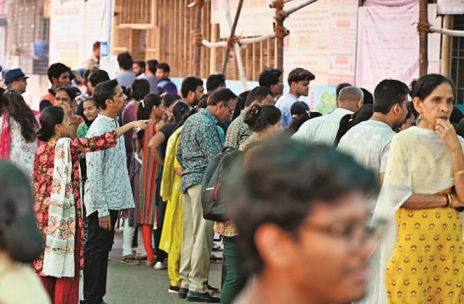 Anxious voters line up outside a polling booth at Sine. Photo: Kirti Surve Prade