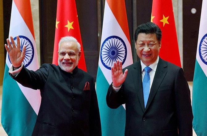 Prime Minister Narendra Modi with Chinese President Xi Jinping. Photo: PTI.