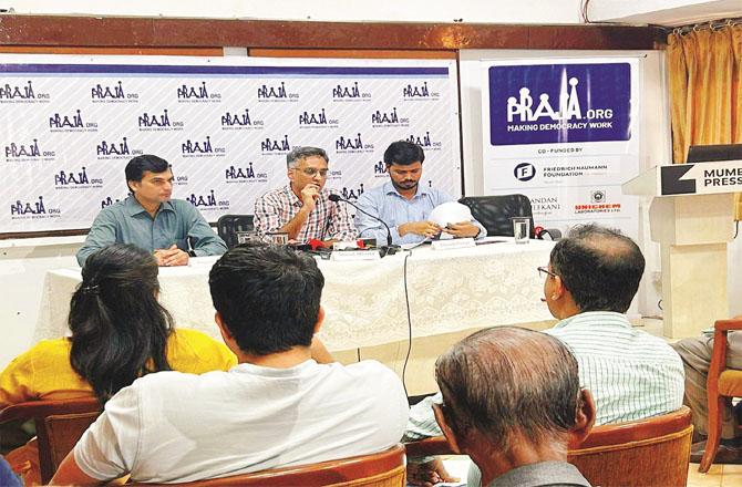Officials of Praja Foundation explaining the important points of the review report in the press conference. Photo: INN