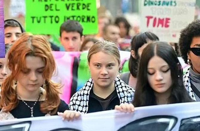 Famous environmental activist Greta Thunberg (centre). Image X