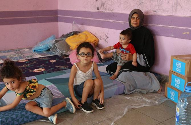 A homeless woman with her children in Lebanon. Photo: X