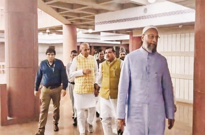 Asaduddin Owaisi, Sanjay Singh, Jagdambika Pal and other leaders leaving the Joint Parliamentary Committee meeting.(PTI)