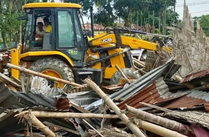 A scene of bulldozer action in Sonapur, Assam. Photo: INN.