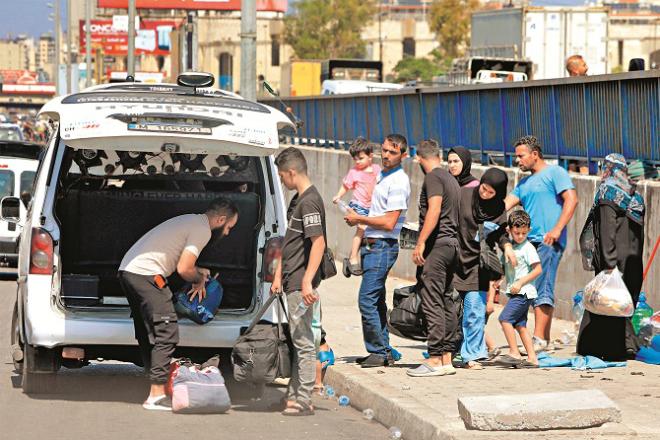 One such family can be seen in the massive displacement of people from Beirut due to the attacks. Photo: INN