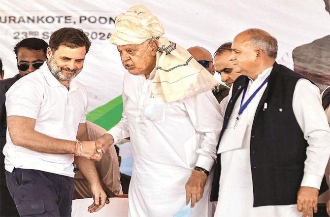 Rahul Gandhi with Dr. Farooq Abdullah during an election rally in Jammu and Kashmir (Photo: PTI)