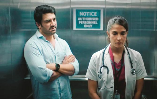 Sharad Kelkar and Harleen Sethi can be seen in a scene from the web series `Doctors`. Photo: INN