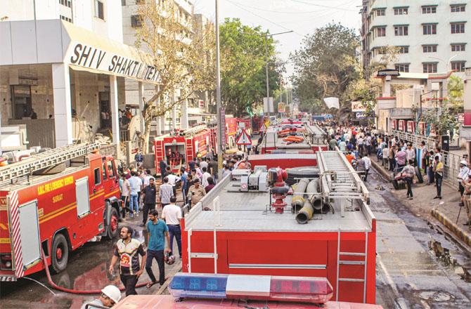 Several fire brigade vehicles were used to extinguish the fire at the textile market. (PTI)