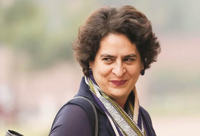 After the road show, Priyanka Gandhi went door to door and met the voters. Photo: PTI