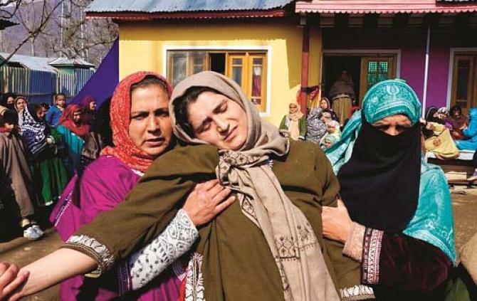 Wasim Ahmed Mir`s sister was taken care of by two women. Photo: The Wire