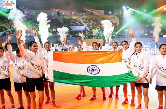 The Indian Khokho team waving the tricolour after winning the final. Photo: PTI.