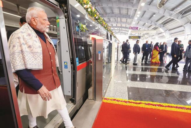 After the journey, Prime Minister Modi gets off the `Namubharat` train. Photo: PTI