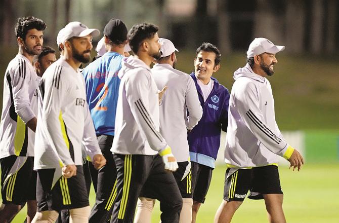 Indian team players and coaches during a practice session in Dubai. Photo: PTI.